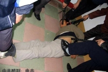 2010-7-15-minghui-persecution-electric-batons 6